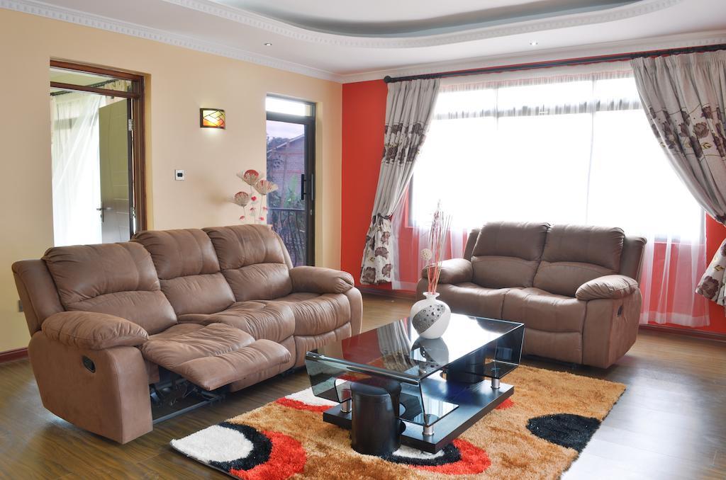 Fahari Palace Serviced Apartments Найроби Номер фото