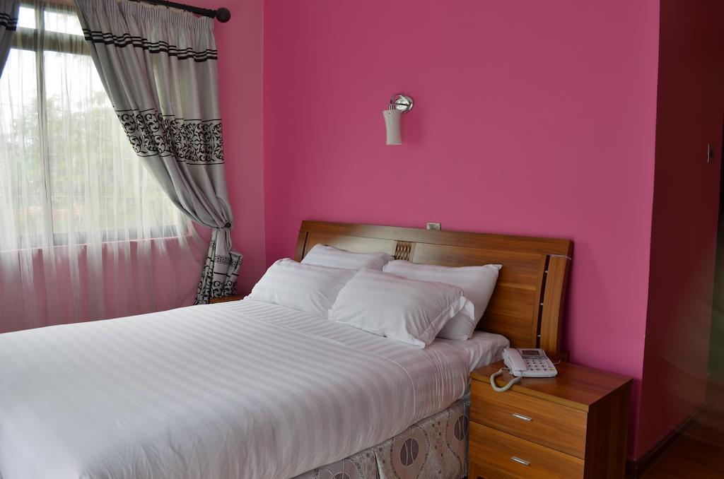 Fahari Palace Serviced Apartments Найроби Номер фото